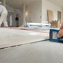 using_lazer_to_align_tiles.jpg