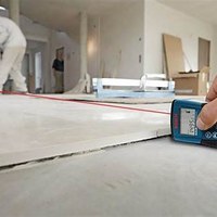 using_lazer_to_align_tiles.jpg